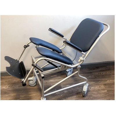 Shower and Commode Chair: Rocker on Wheels